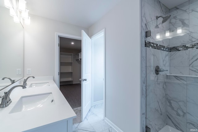 bathroom with vanity and walk in shower