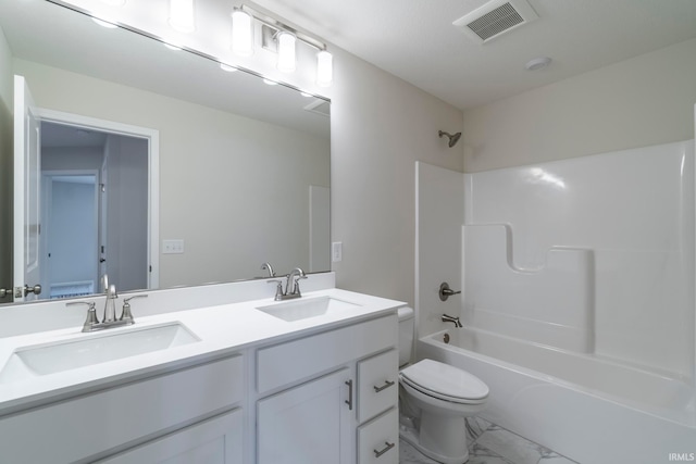 full bathroom with vanity, toilet, and shower / bath combination