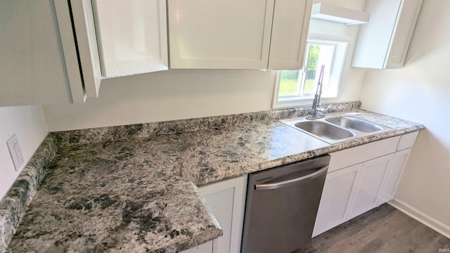 kitchen with white cabinets, dishwasher, dark hardwood / wood-style flooring, and sink