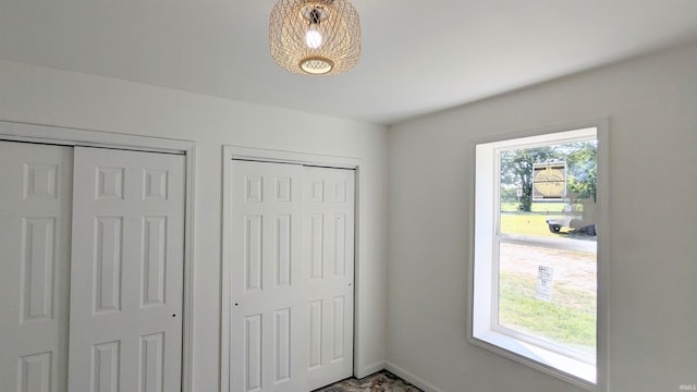 bedroom with two closets