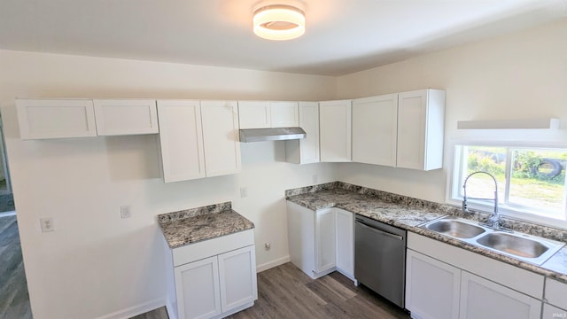 kitchen with dishwasher, white cabinetry, and sink