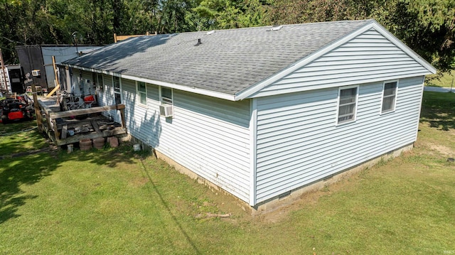 exterior space featuring a lawn and cooling unit