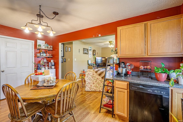 dining space with a textured ceiling, light hardwood / wood-style flooring, and ceiling fan