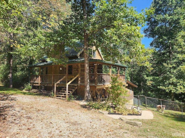 view of front of house with a wooden deck