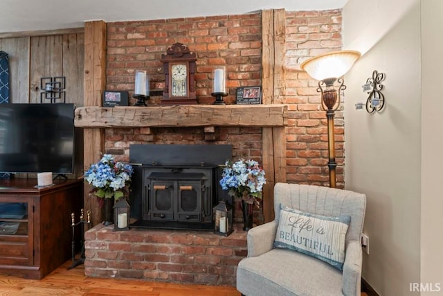 living room featuring hardwood / wood-style floors and a fireplace