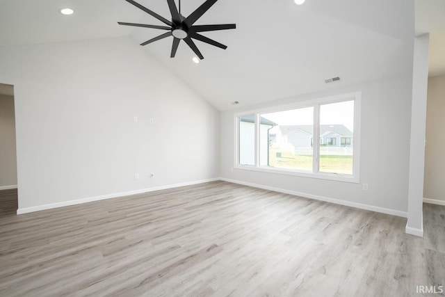 empty room with light wood-type flooring, baseboards, visible vents, and a ceiling fan