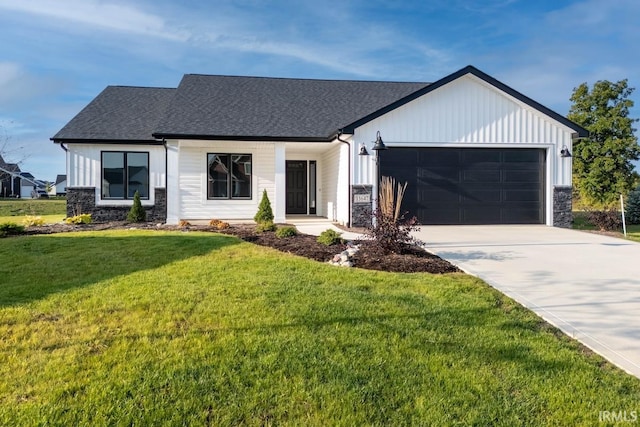 modern inspired farmhouse with a shingled roof, an attached garage, board and batten siding, driveway, and a front lawn