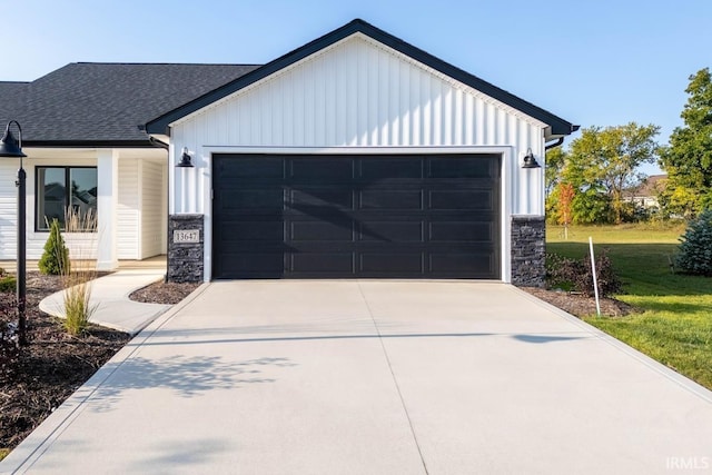 garage featuring driveway