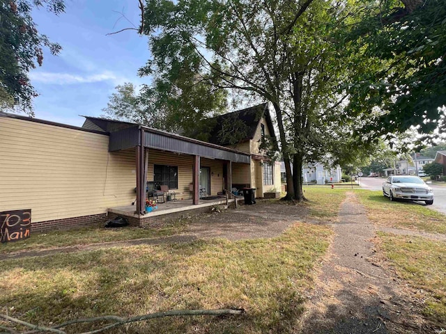 view of yard featuring a porch