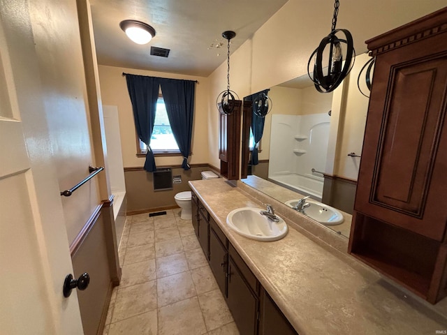 full bathroom with shower / bathing tub combination, vanity, and toilet