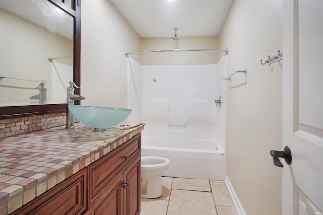 full bathroom featuring tile patterned flooring, toilet,  shower combination, and vanity