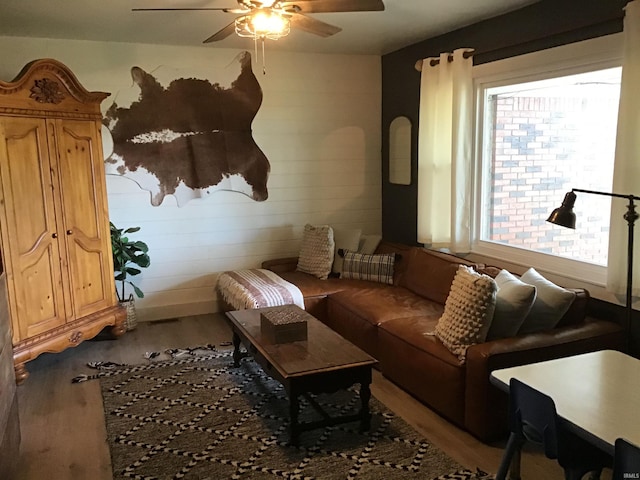 living room featuring ceiling fan