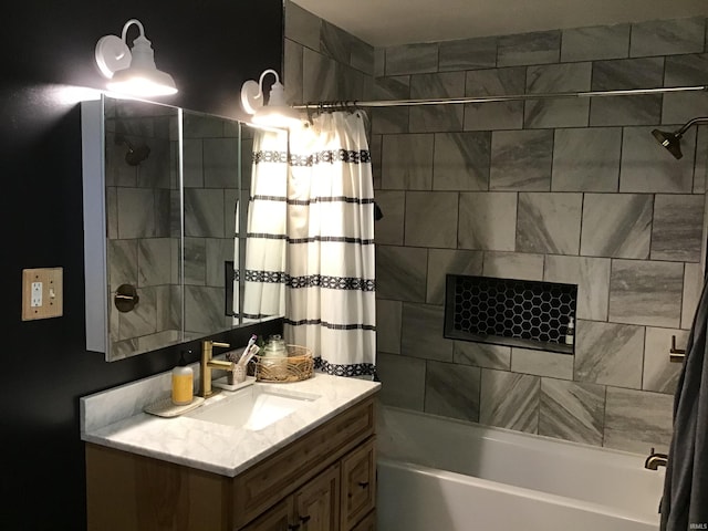 bathroom with shower / bath combo and vanity