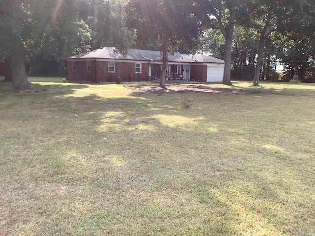 view of yard featuring a garage