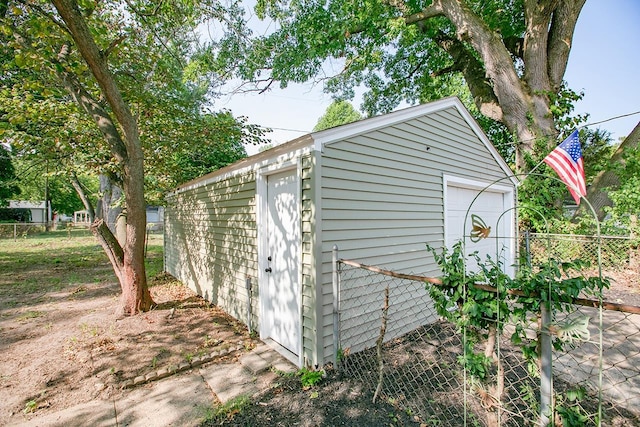 view of outdoor structure with a garage