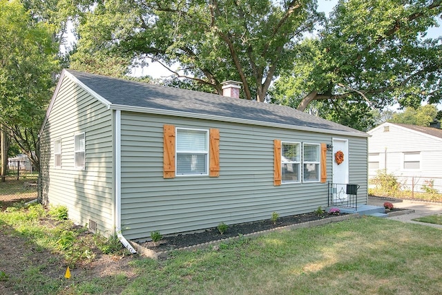 exterior space with a lawn