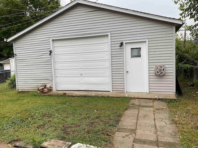 garage featuring fence