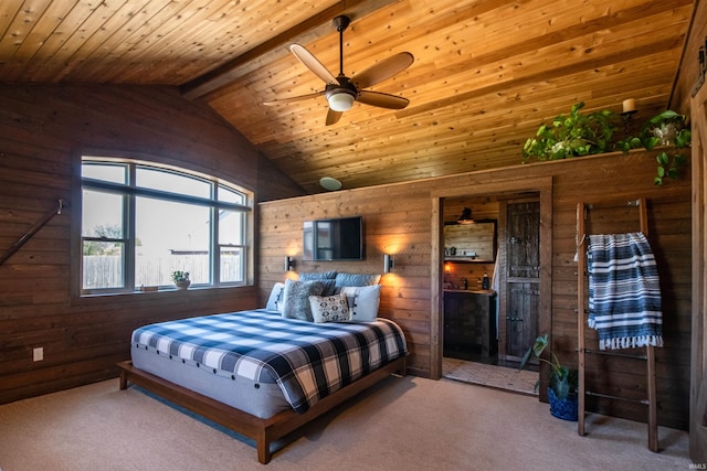 bedroom with lofted ceiling with beams, wooden ceiling, carpet flooring, wood walls, and ceiling fan