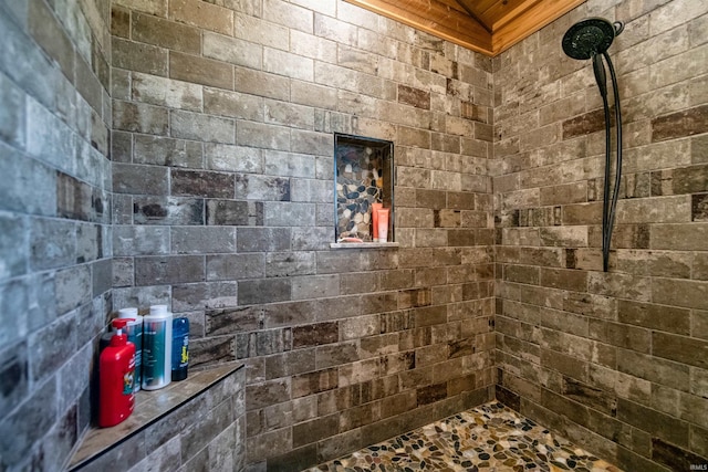 bathroom featuring tiled shower