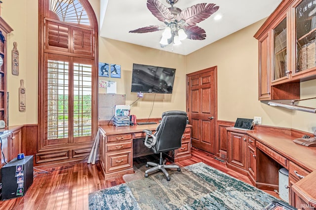 office with ceiling fan and hardwood / wood-style floors