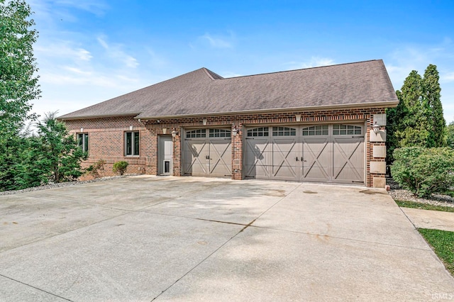 exterior space with a garage