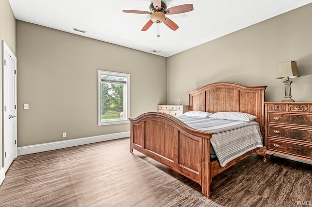 bedroom featuring ceiling fan and hardwood / wood-style floors