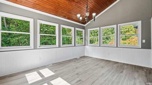 unfurnished sunroom with an inviting chandelier, wooden ceiling, and vaulted ceiling