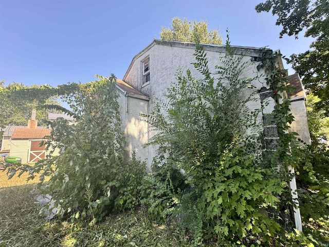 view of home's exterior with stucco siding