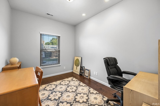 home office featuring dark hardwood / wood-style flooring