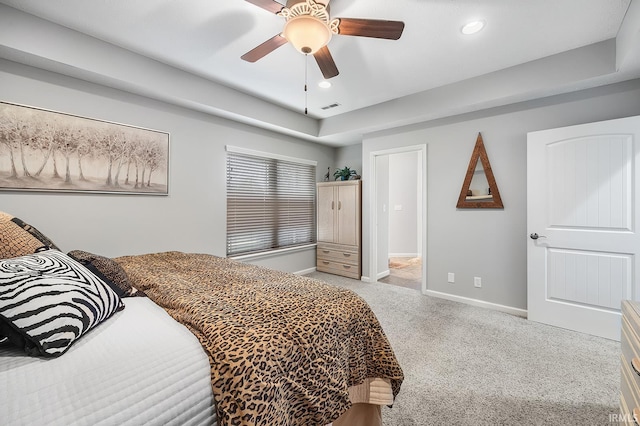 bedroom featuring ceiling fan and light carpet