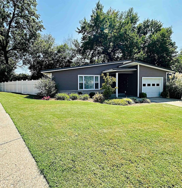 ranch-style home with a front lawn