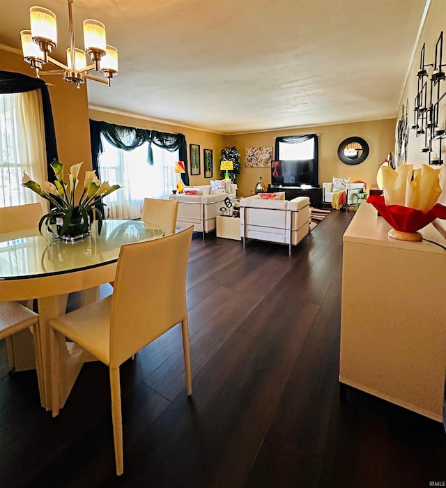 dining space featuring dark wood-type flooring and a notable chandelier