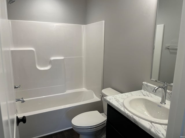 full bathroom featuring vanity, toilet, and shower / washtub combination