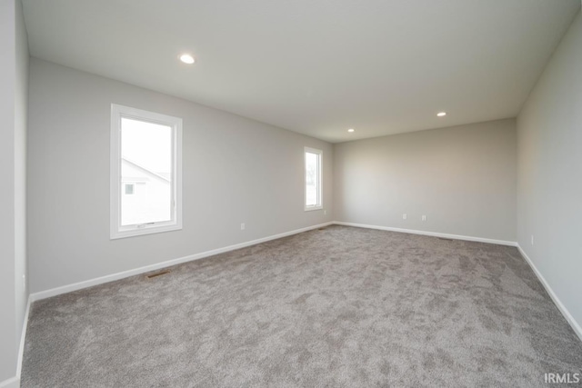 view of carpeted spare room