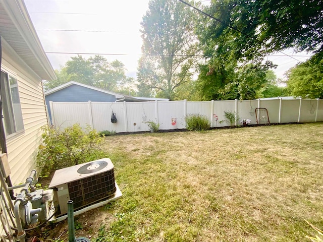 view of yard with central AC unit