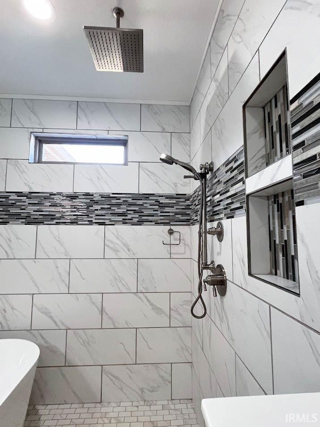 bathroom featuring tiled shower