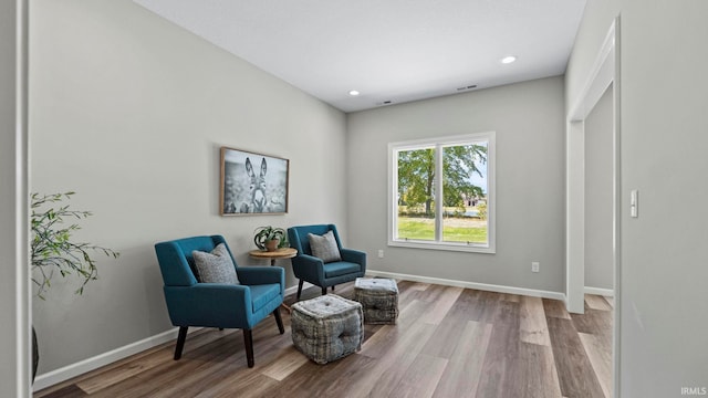 living area featuring light hardwood / wood-style floors