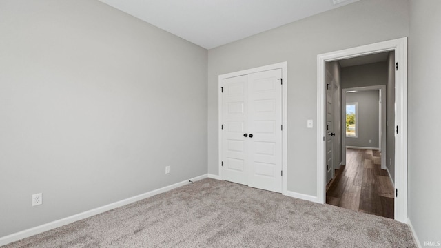 unfurnished bedroom featuring hardwood / wood-style flooring