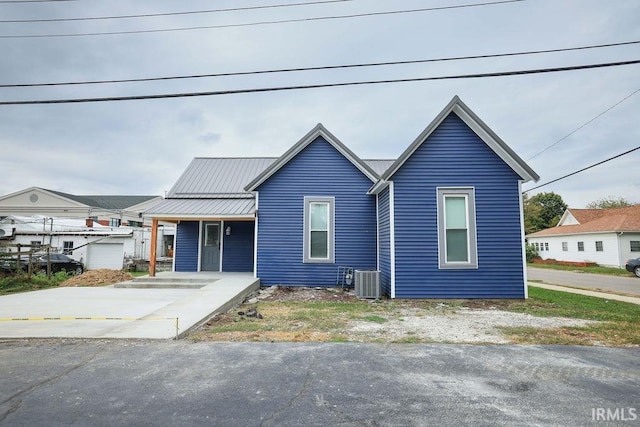 view of front of property with central air condition unit