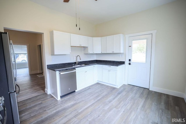 kitchen with plenty of natural light, ceiling fan, sink, and appliances with stainless steel finishes