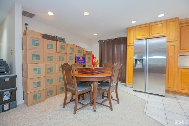 view of tiled dining space