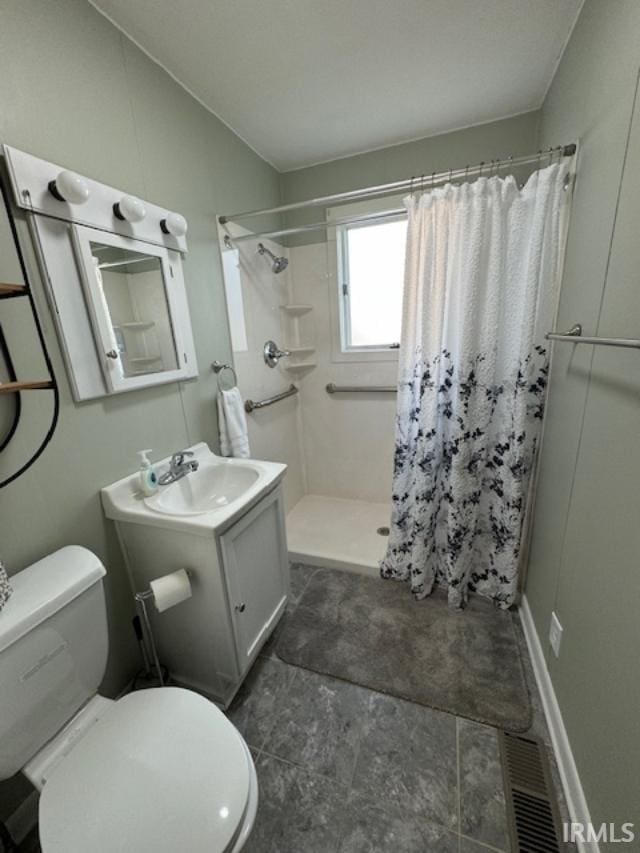 bathroom featuring vanity, toilet, a shower with shower curtain, and lofted ceiling