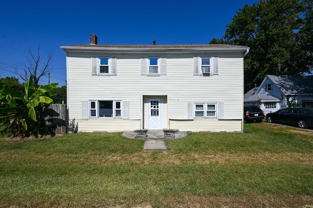 view of front of home with a front yard