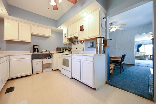 kitchen with light carpet, white cabinetry, ceiling fan, and white electric range