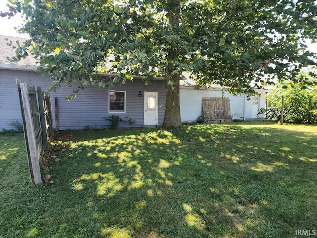 exterior space with a front lawn