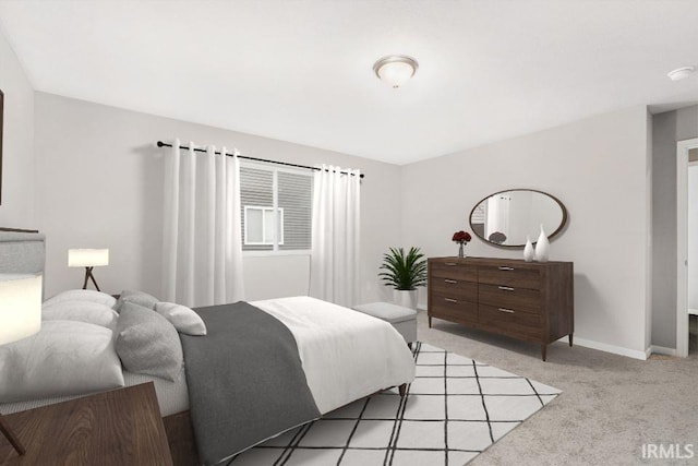 bedroom featuring light colored carpet