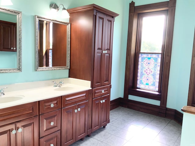 bathroom with vanity and tile patterned floors