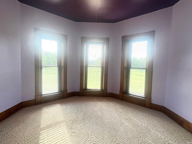 view of carpeted spare room