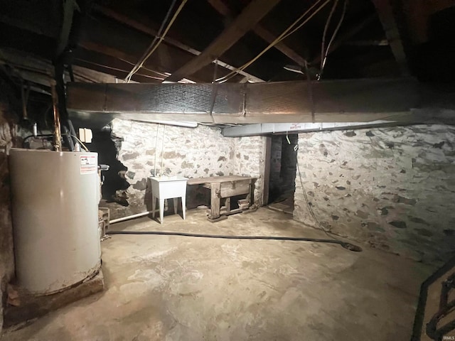 basement featuring water heater