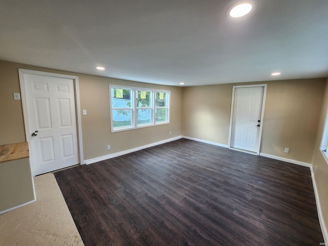 interior space with dark wood-type flooring